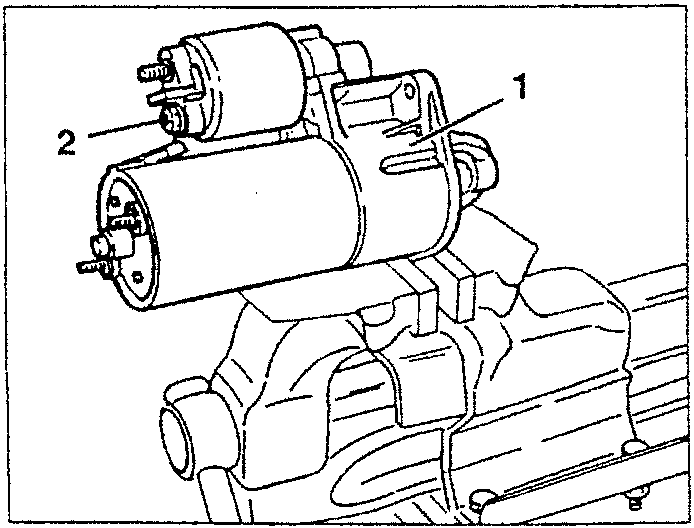 Starter motor mounted on a vice with protective clamps