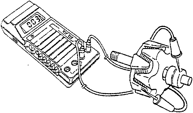 Tester connected to rotor with probes on collector ring and rotor core