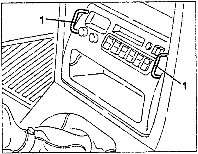 Illustration showing special removal brackets inserted into holes on the car radio