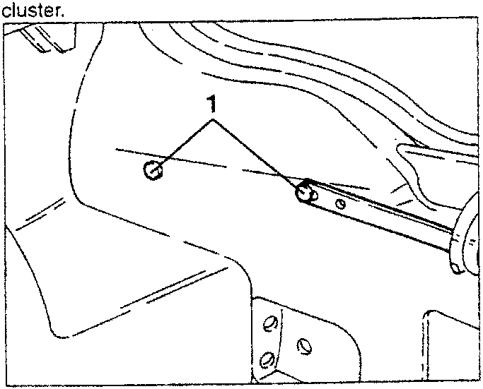Shows screw securing steering column to instrument cluster