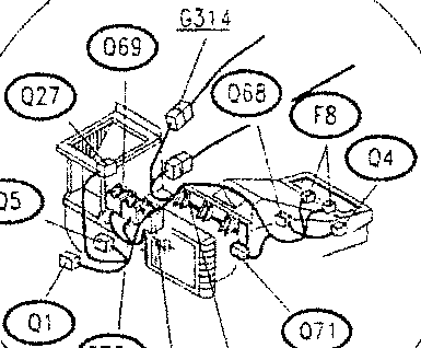 Close-up of electrical components in the engine bay, including fuses and relays.