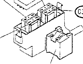 Close-up of fuse box components, showing specific fuse locations.