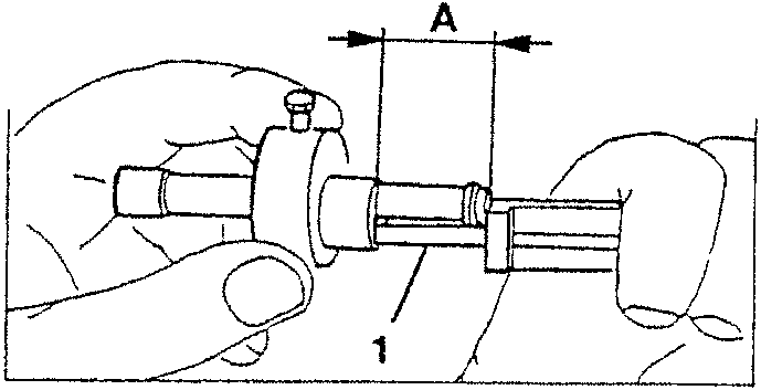 Using a dial gauge to check dimension 'B' on the sensor