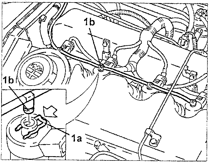 Close-up of fuel return pipe connection to injectors