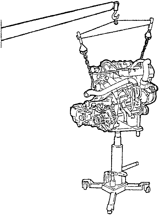 Engine being lifted by hydraulic crane