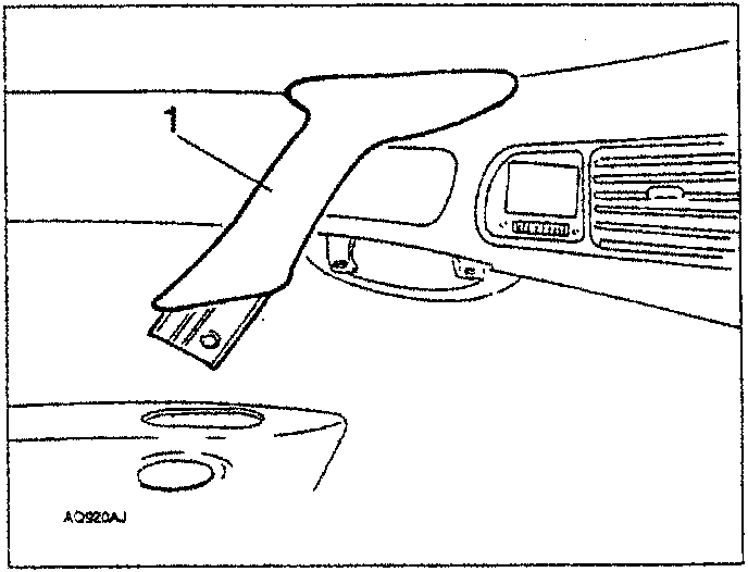 Diagram showing utility compartment with four rear screws to be slackened.