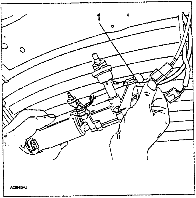 Diagram showing hands pulling a wiper motor from the tailgate