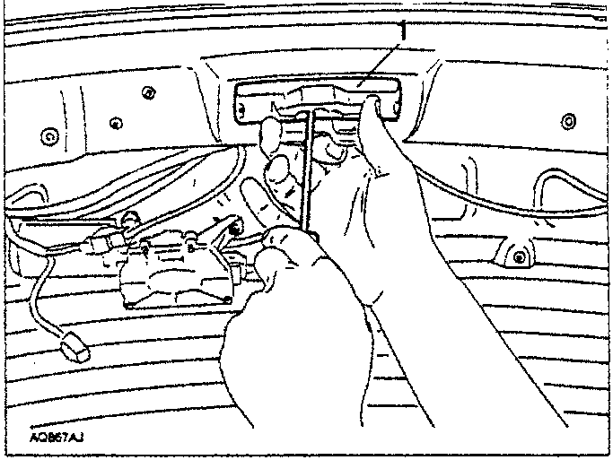 Diagram showing hands slackening screws on tailgate lock