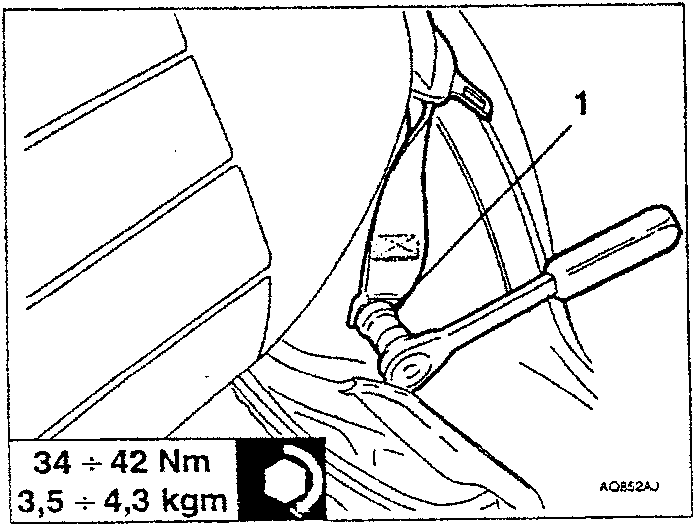 Lower screw fastening the rear seat belt being removed