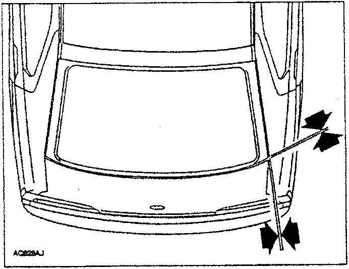 Illustrates rear door hinge removal process for vehicle