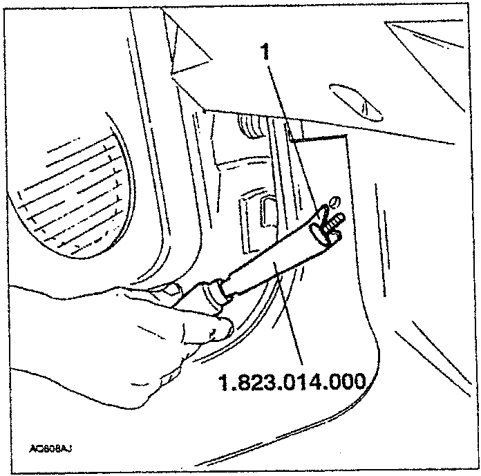 Illustration showing a hand using tool 1.823.014.000 to remove a front heelboard fastening cap.
