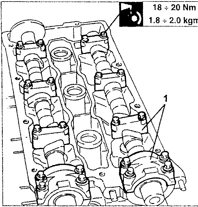 Camshaft caps with torque specification