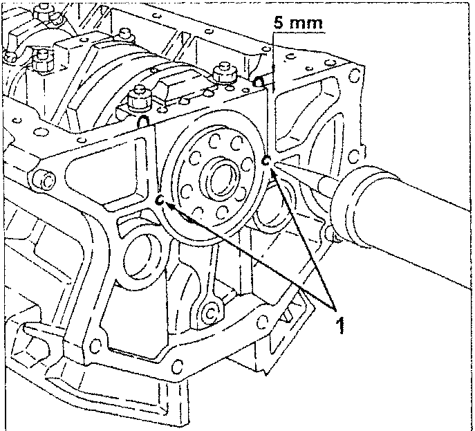 Engine oil sump coupling with sealant application point marked at 5 mm