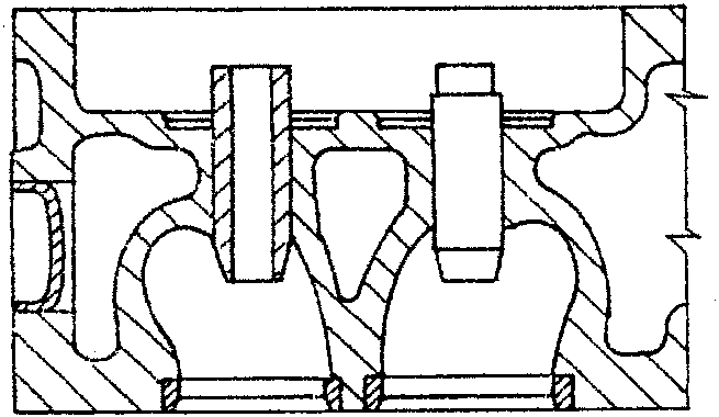 Cross-section view of cylinder head with valve guides and camshaft bearings
