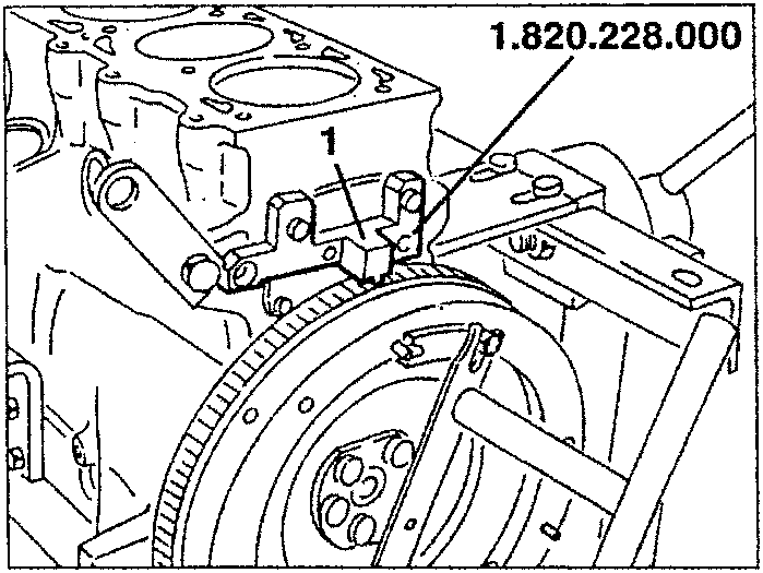 Flywheel stop tool installed on engine block