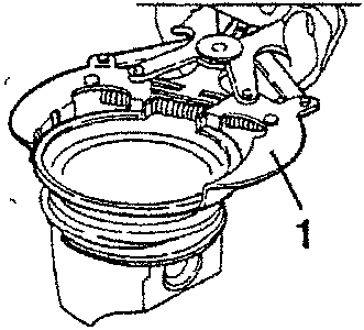 Piston with oil scraper ring removed
