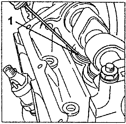 Engine with tappet adjustment plate being prised off