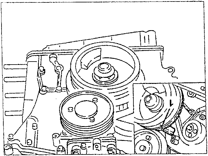 Engine timing belt installation with pulleys and tensioner components.