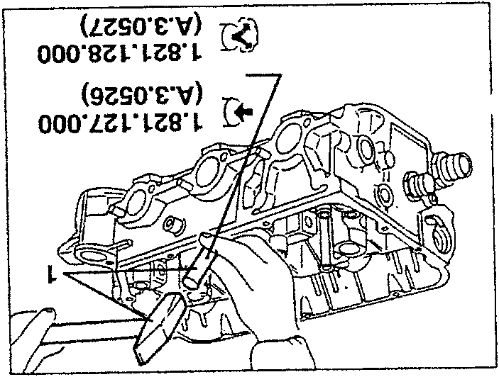 Illustration showing insertion of new valve guides into cylinder heads with specified torque values.