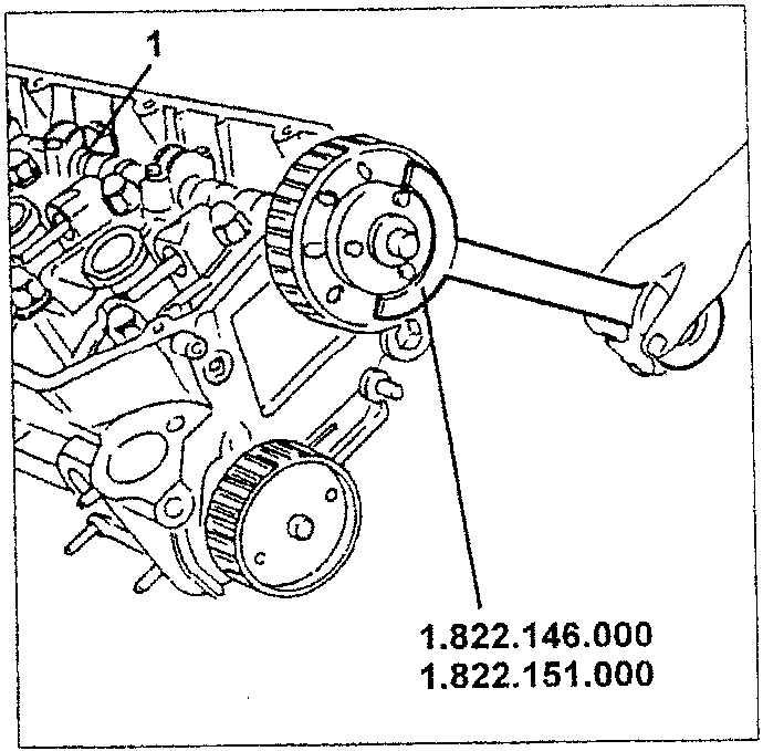 Camshaft being turned with tools