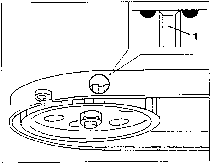 Flywheel with the T notch and the fixed reference 1