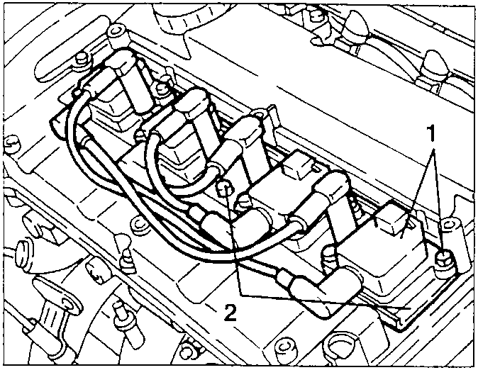 Ignition coils and their support bracket on the cylinder head
