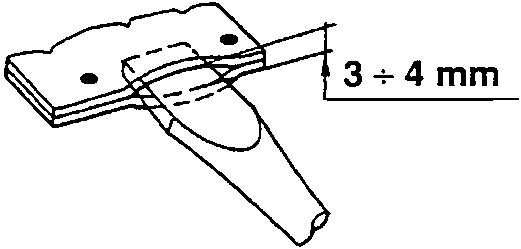 Chisel inserted between welded sheets with gap marked 3÷4 mm