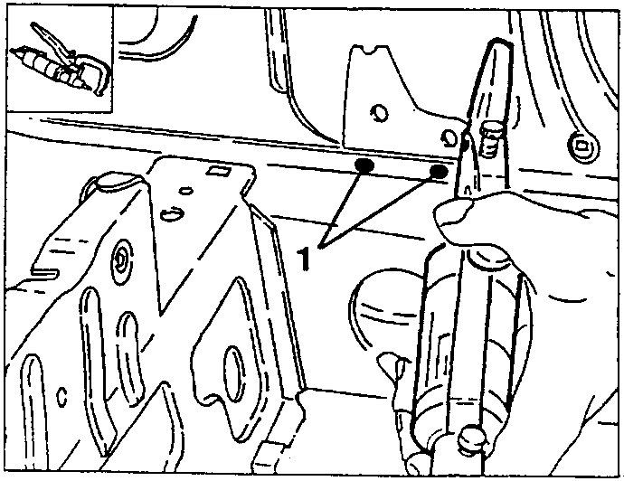 Close-up of a hand using a spot cutter to remove welding points on a metal structure.