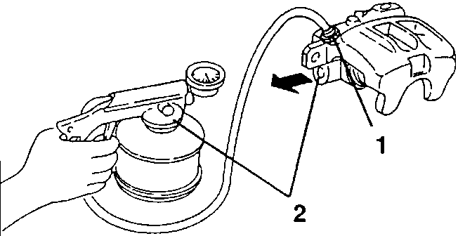 Brake fluid being bled from caliper using a bleeder tool.