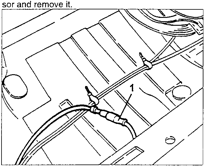 Floor under the rear seat showing the inductive sensor electrical connection marked 1