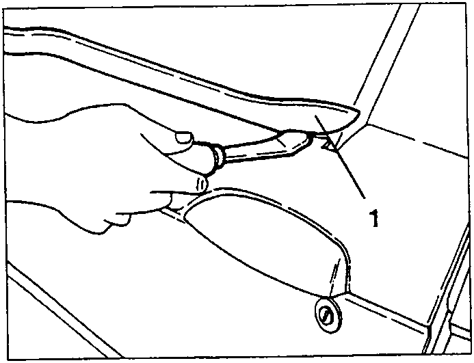 Pulling the external weather strip 1 out of its seating with a screwdriver