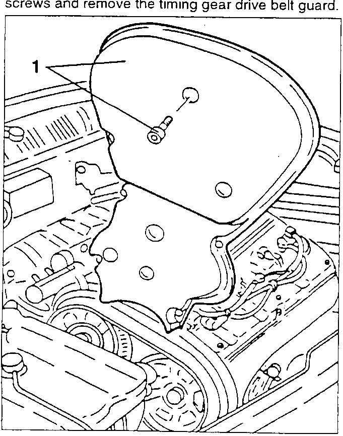 Timing gear drive belt guard being removed from engine