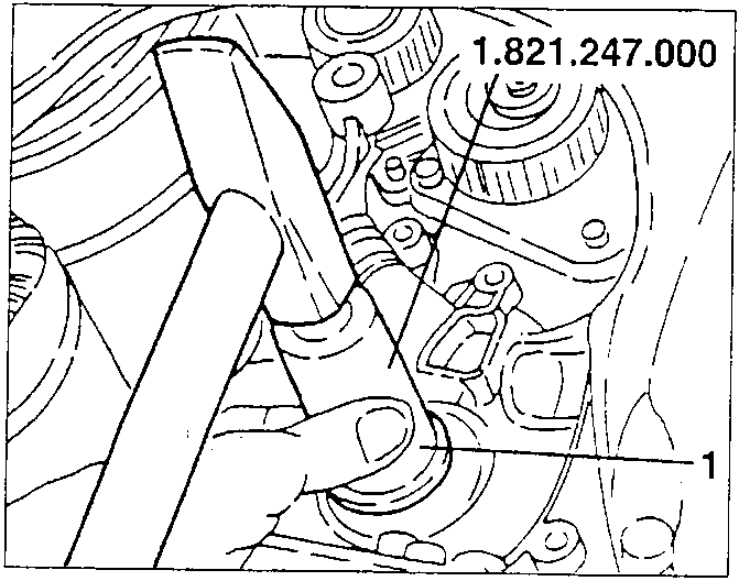 Oil seal being removed with tool