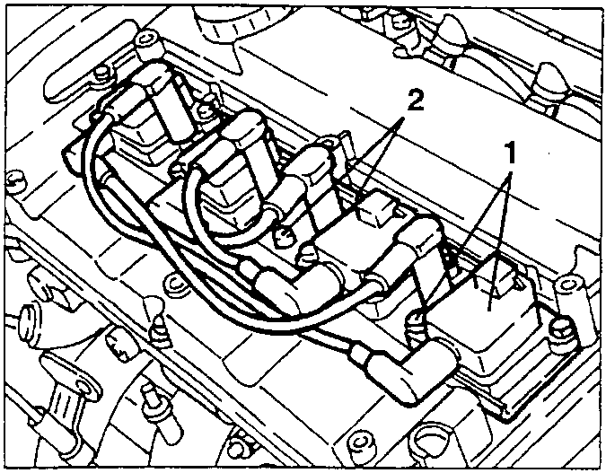 Ignition coils and support bracket being removed