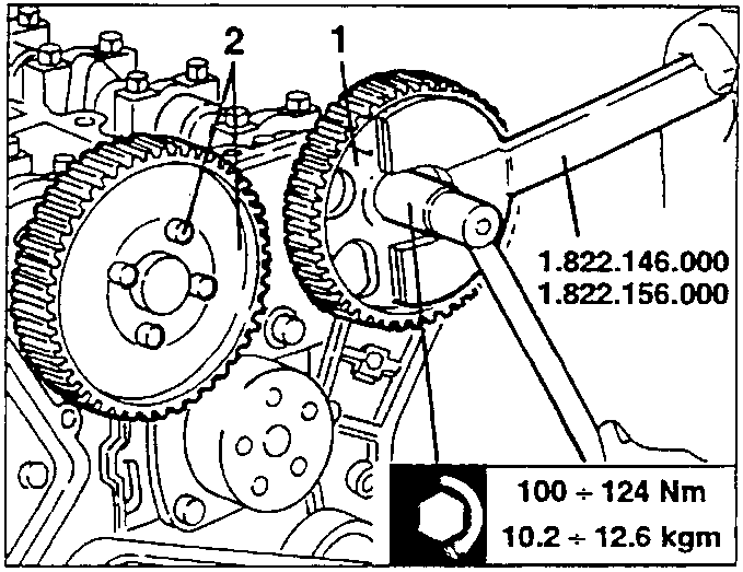 Timing gear exhaust side drive pulley being removed with specified tools