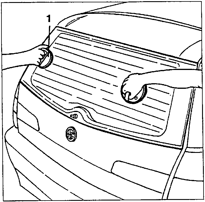 Diagram showing hands holding suction cups on rear windscreen.