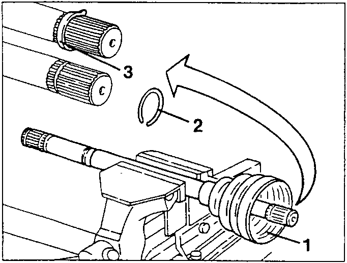 C.V. joint being positioned on axle shaft with flexible retainer ring and fastener clamp