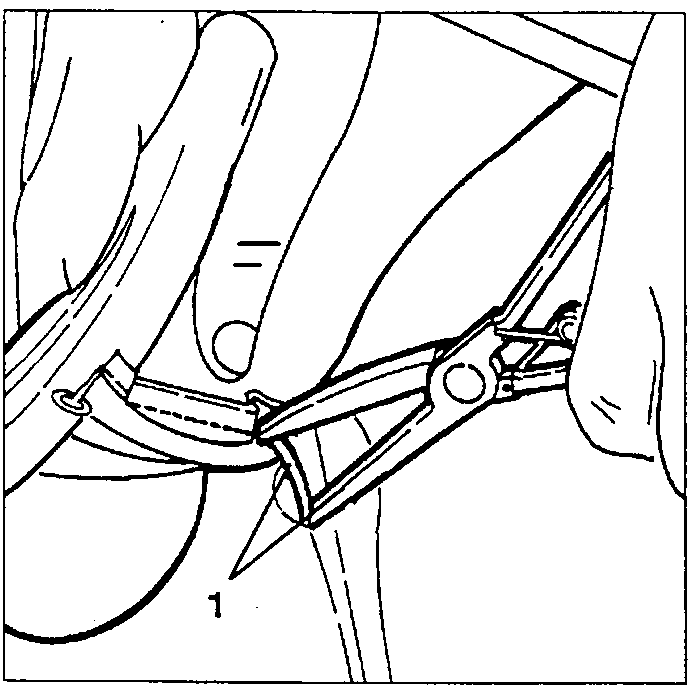 Hand using pliers to secure clip on covering