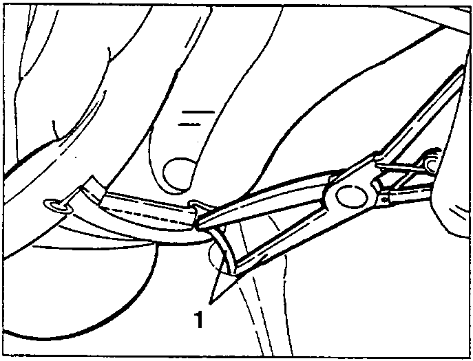 Hand using pliers to fix a clip on a car seat covering