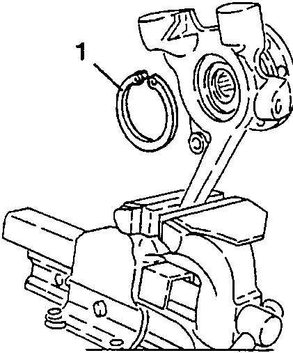 Diagram showing clamping the wheel upright/hub assembly in a vice with protective jaws to remove the hub retainer ring.