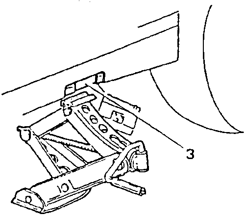 Close-up of a jack socket and tow hooks attached to the vehicle's undercarriage.