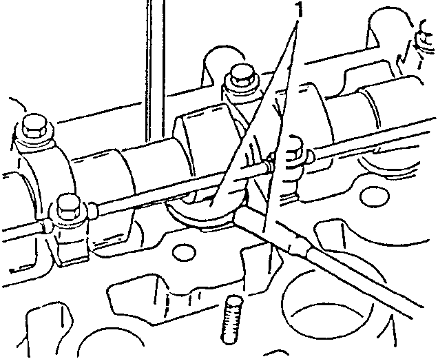 Engine valve train with scribe and magnet removing cap