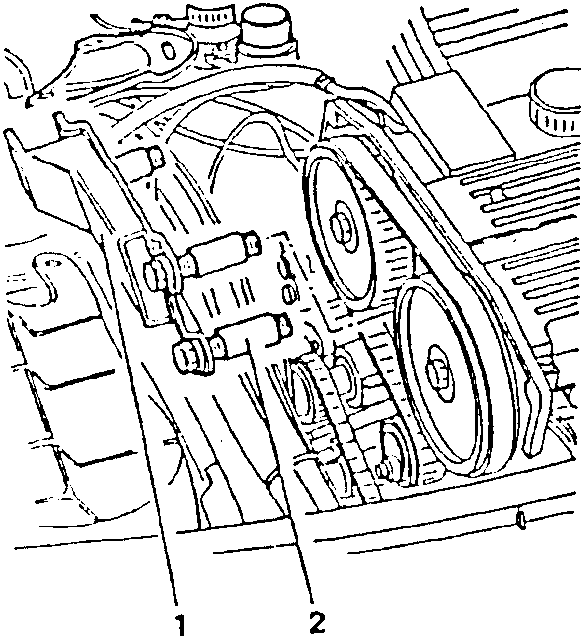 Engine with timing belt cover and pulleys