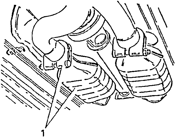Catalytic converters being removed with tools