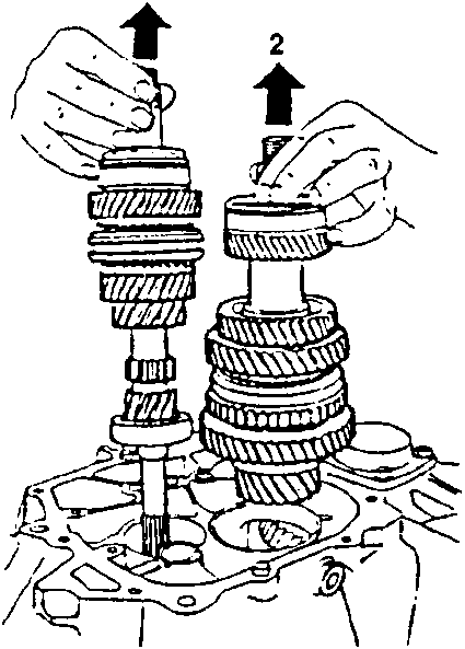 Illustration showing hands removing two shaft assemblies with arrows indicating upward removal