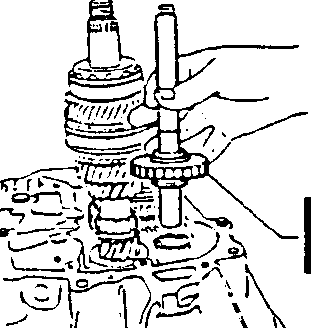Diagram showing installation of reverse speed shaft and idle gear with safety pawl