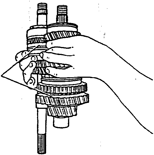 Illustration of hand inserting speed engagement safety pawls using tool 1.821.047.000