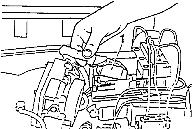 Diagram showing hand disconnecting power supply wiring comb from ABS control unit