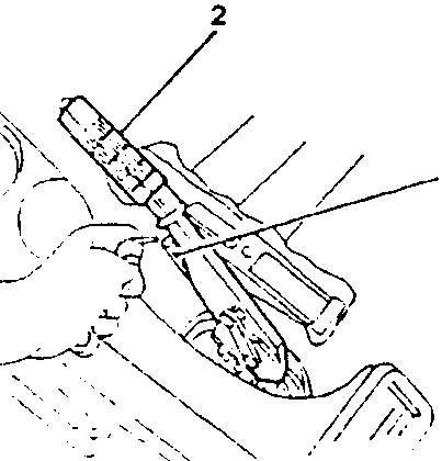Handbrake cable attachment to caliper