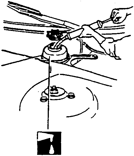 Illustrates removing or installing windshield wiper motor assembly